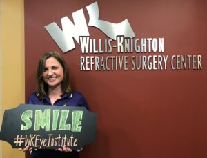 Patient smiling after SMILE Eye Surgery